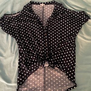 Polka dot t-shirt.